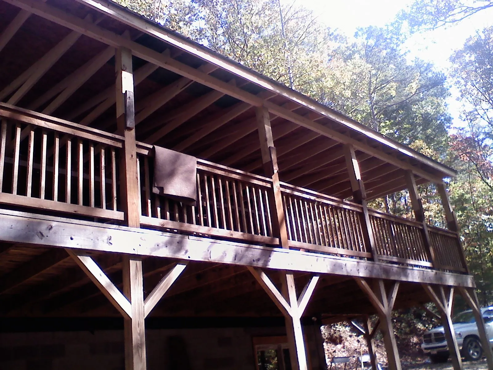 Timber framing under a new elevated porch and deck — Roof Leak Repair in Carville by Roofing Brothers